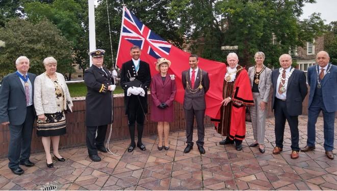 3 September 2021 - Celebrating Merchant Navy Day by raising the Red Ensign in the presence of the special guests.
